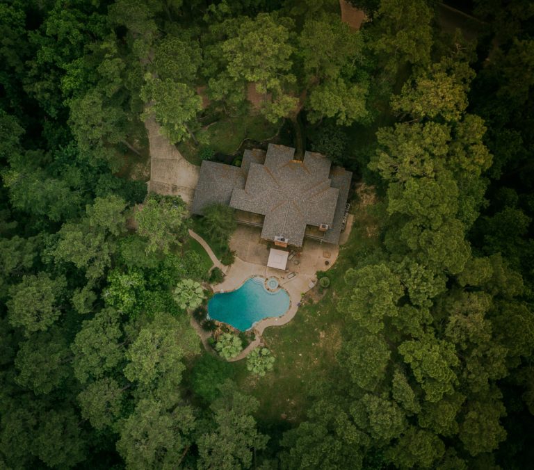 aerial view photography of house with swimming pool 903028 768x676